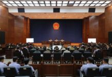 온라인 사기 혐의로 체포된 Kokang 지역 전 지도자, 중국에서 첫 재판