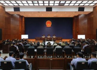 온라인 사기 혐의로 체포된 Kokang 지역 전 지도자, 중국에서 첫 재판